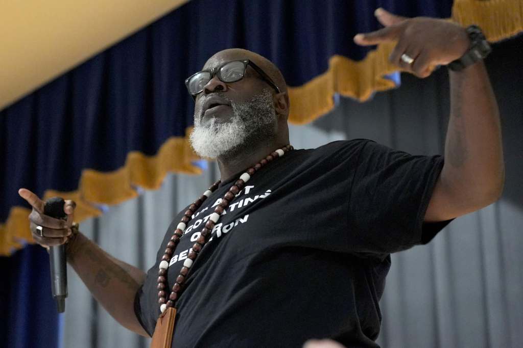 A closeup of Brad 'Kamikaze' Franklin speaking on stage