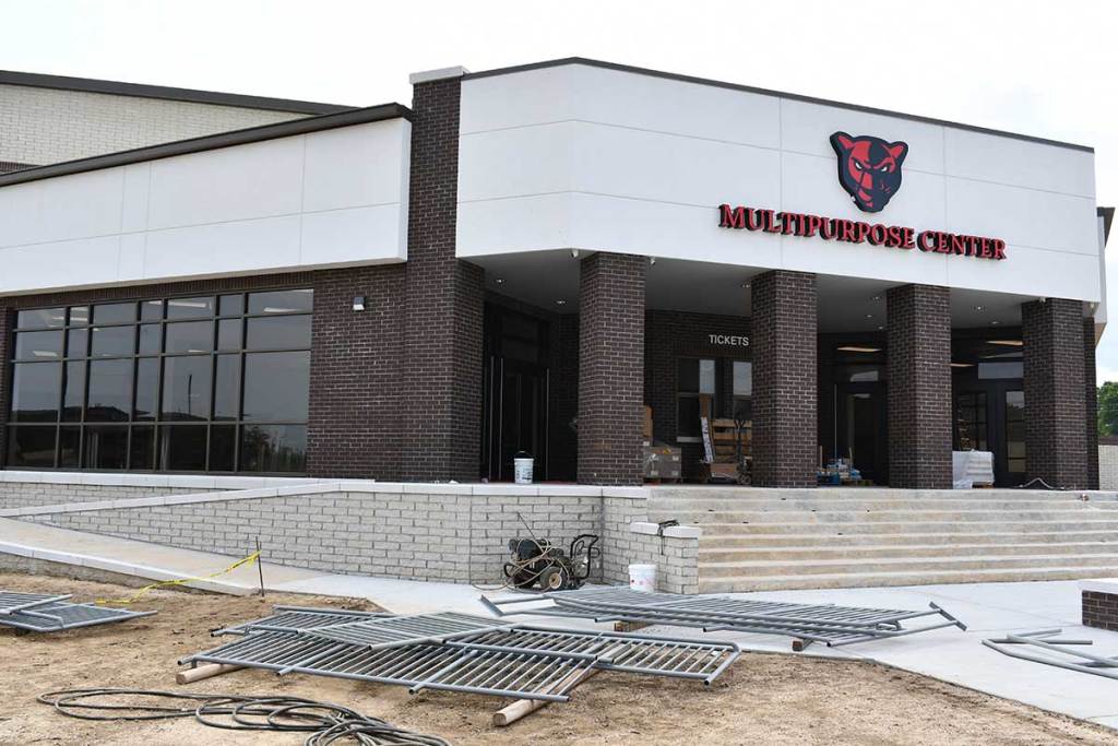 The exterior of Petal High School’s new multipurpose center shows construction materials near the entrance.