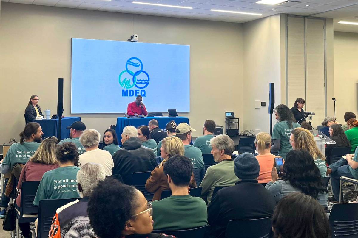 A room full of people sitting in a MDEQ meeting
