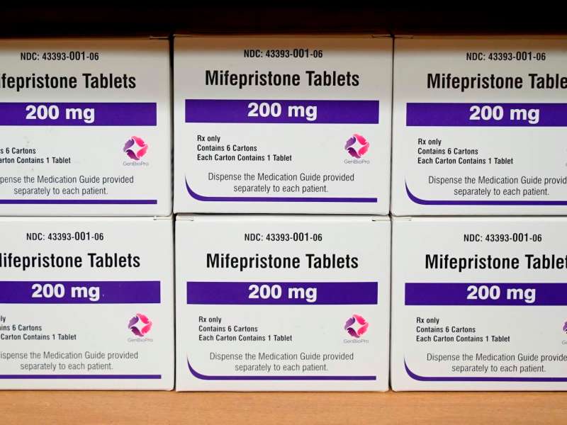 Two rows of boxes of the drug mifepristone