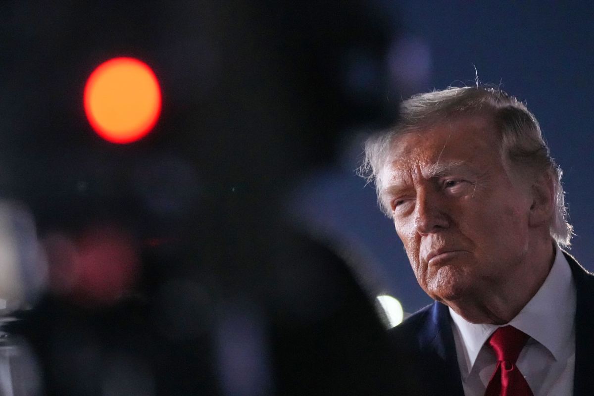A view of Donald Trump seen past a camera